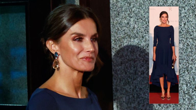 Queen Letizia wears a blue dress with a plunging neckline in the back Queen Letizia at the Royal Theater