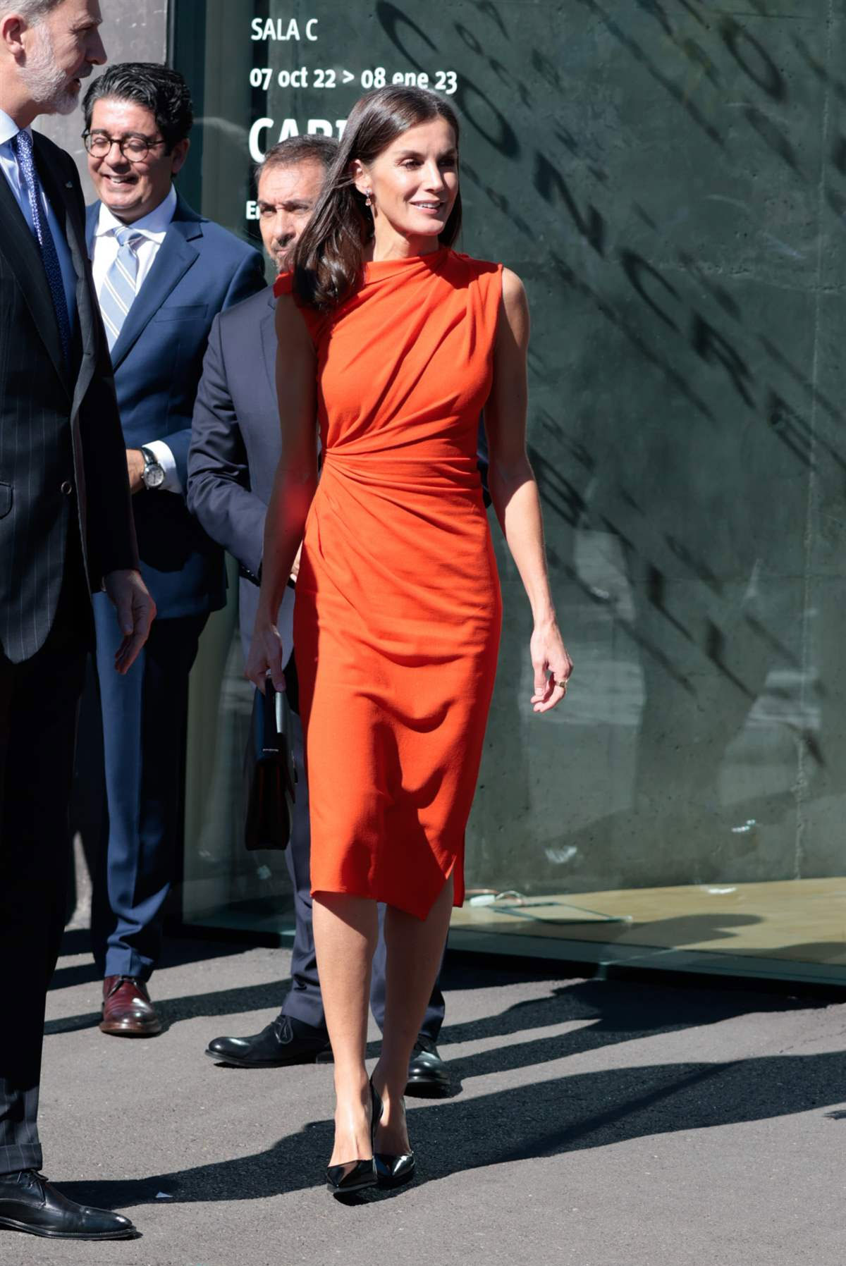 Queen Letizia in orange dress by Zara
