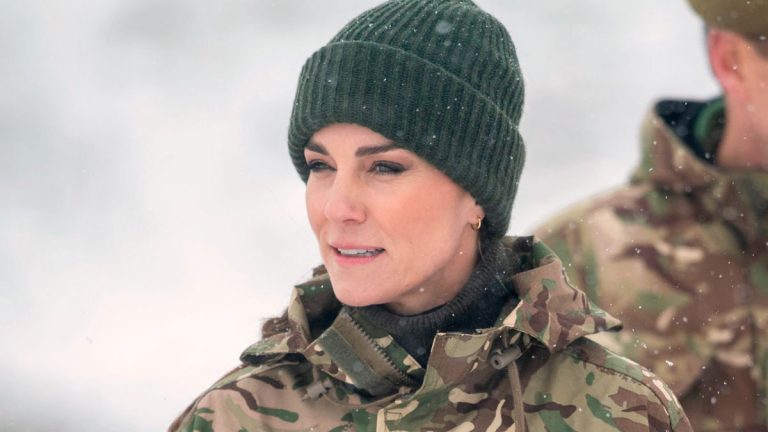 Kate Middleton dresses up in military attire and braves the snow with the Irish Guard Kate Middleton with the Irish Guards