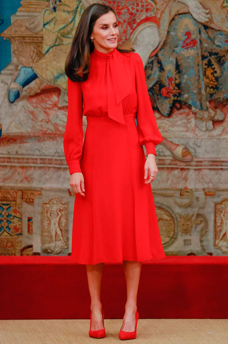 Queen Letizia in a red dress by Poéte