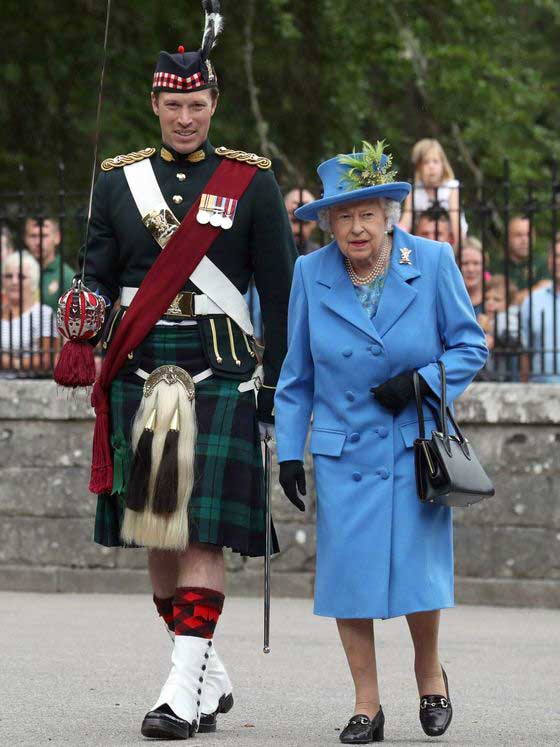 Major Johnny, accompanying Queen Elizabeth II