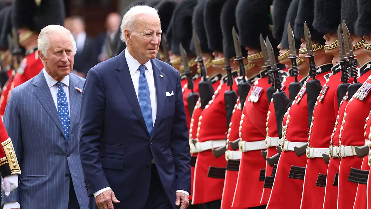 Biden walks in front of King Charles