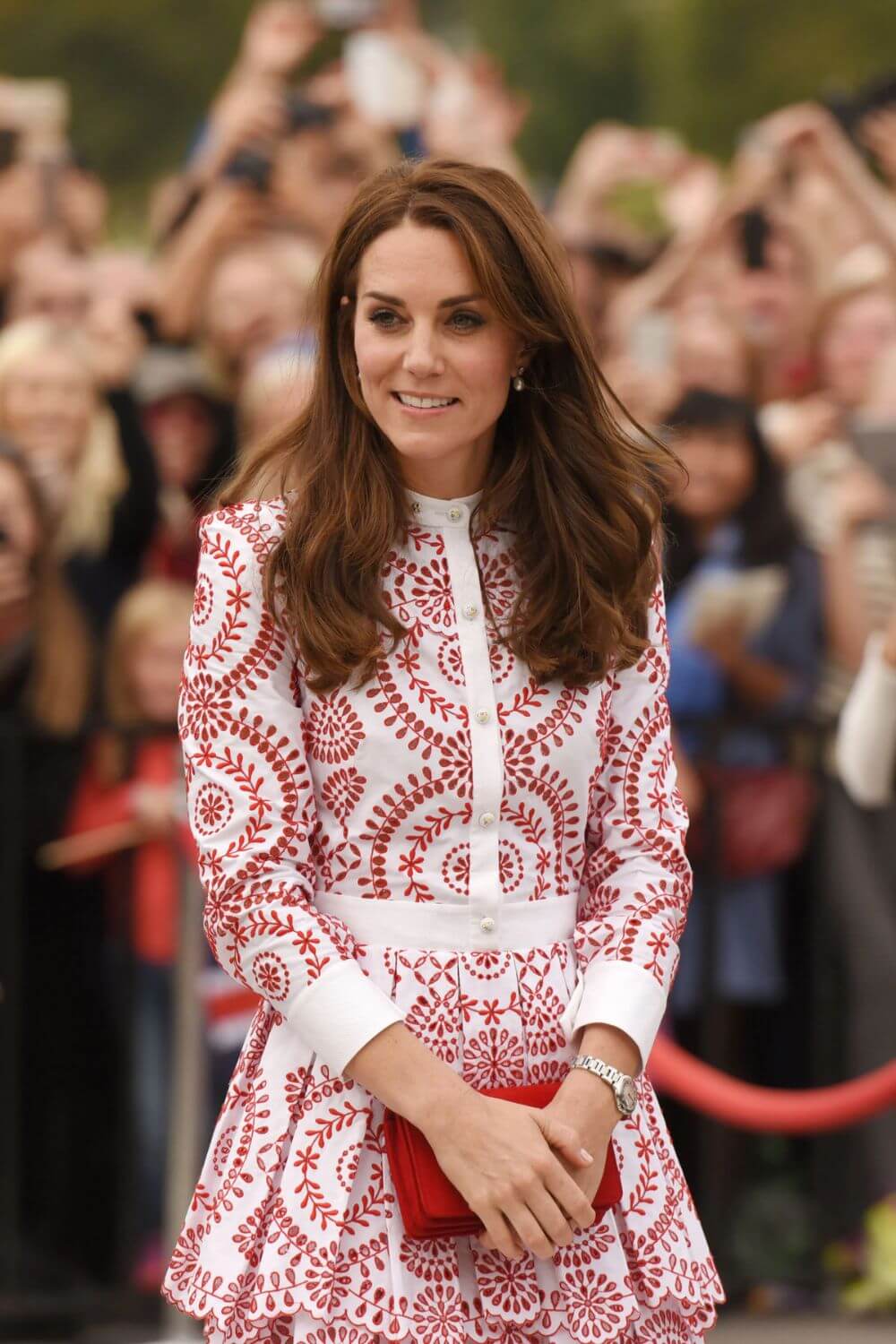 Kate Middleton pairing her Cartier watch with an elegant outfit