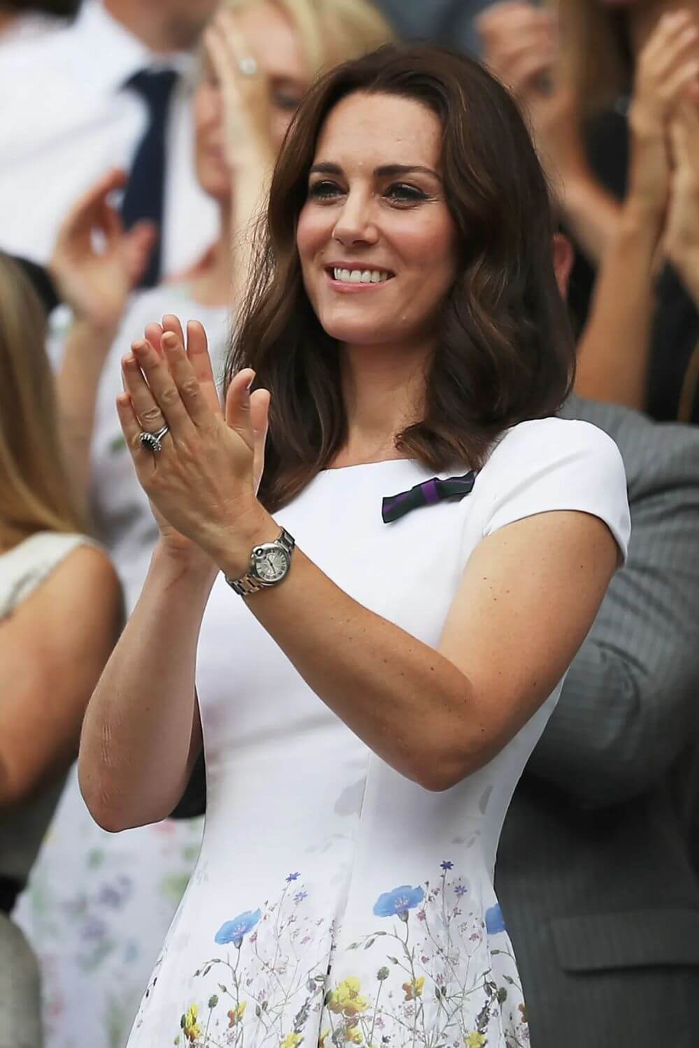 Kate Middleton with a wrist watch paired with a casual outfit