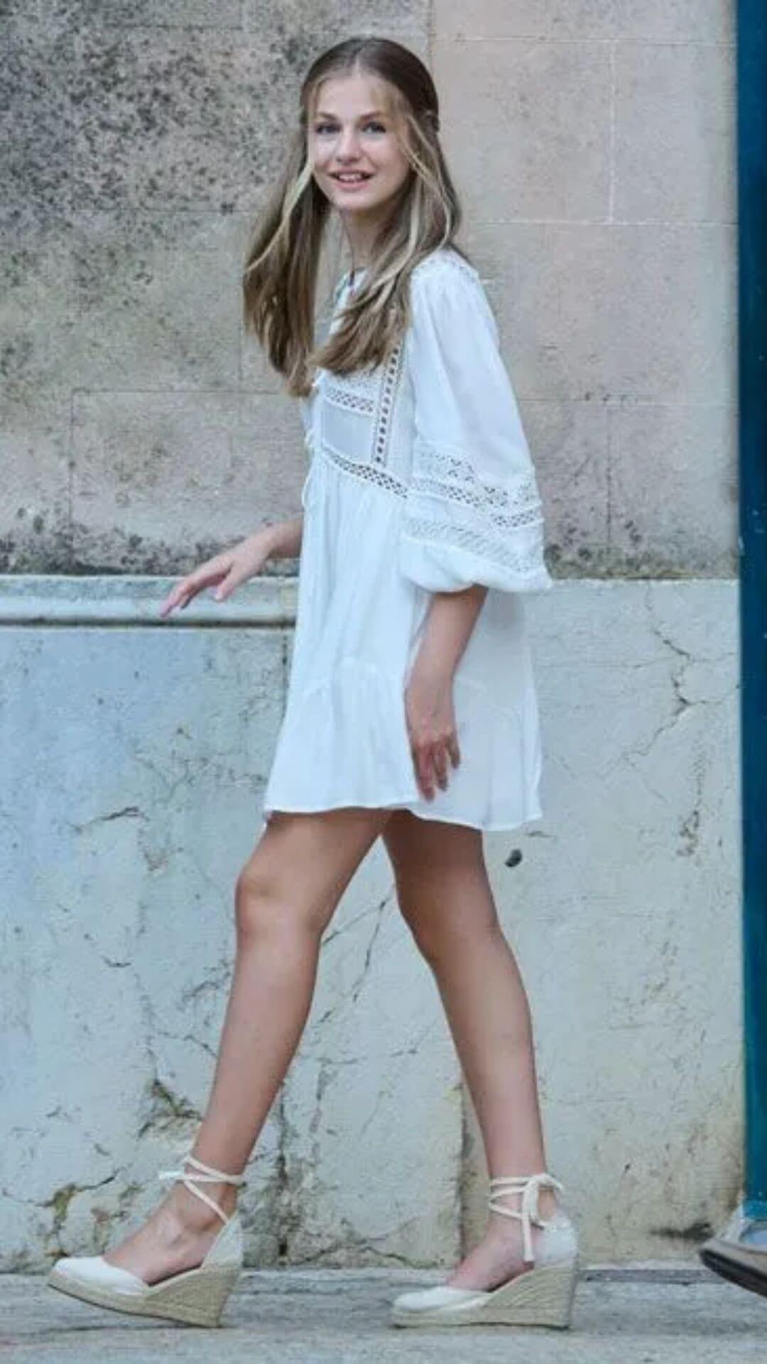 Princess Leonor wearing a white lace dress