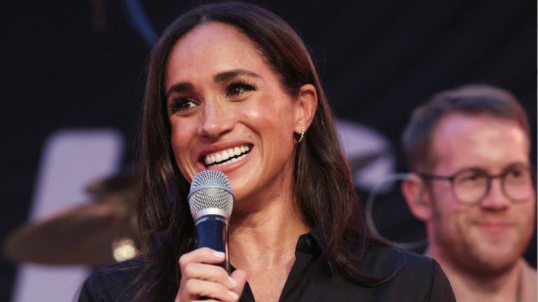 PHOTOS: How much does the shirt dress Meghan Markle wore to the Invictus Games cost? Meghan Markle's Banana Republic shirt dress
