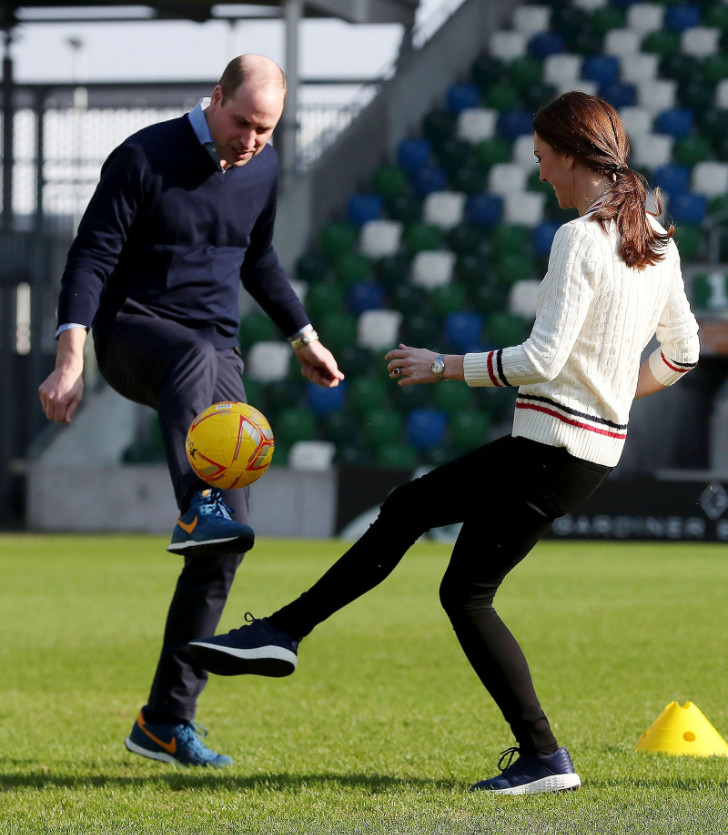 Kate Middleton and Prince William playing
