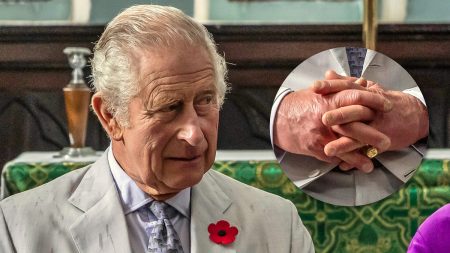 King Charles' sausage fingers