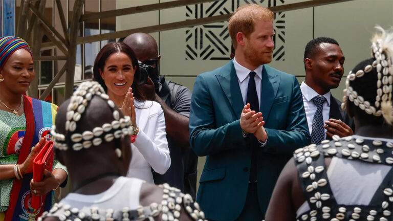 PHOTOS: Meghan Markle impresses in white suit in Nigeria Meghan Markle's white suit in Nigeria