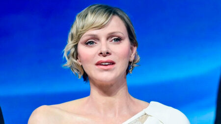 Princess Charlene in White Jumpsuit