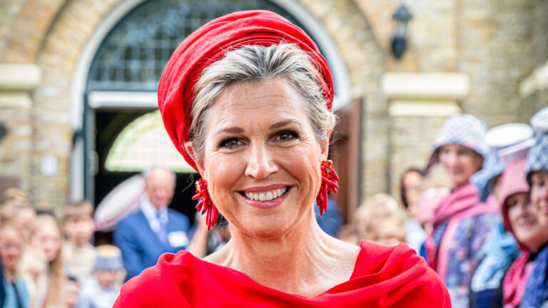 Queen Maxima of the Netherlands: Tight Dress, Turban Headdress and Two-Tone Heels Queen Maxima in a red dress