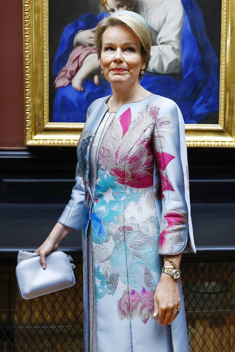 Queen Mathilde Wore an Armani Privé Jacquard Coat with a Giorgio Armani Clutch Queen Mathilde in Floral Armani Privé Coat in France