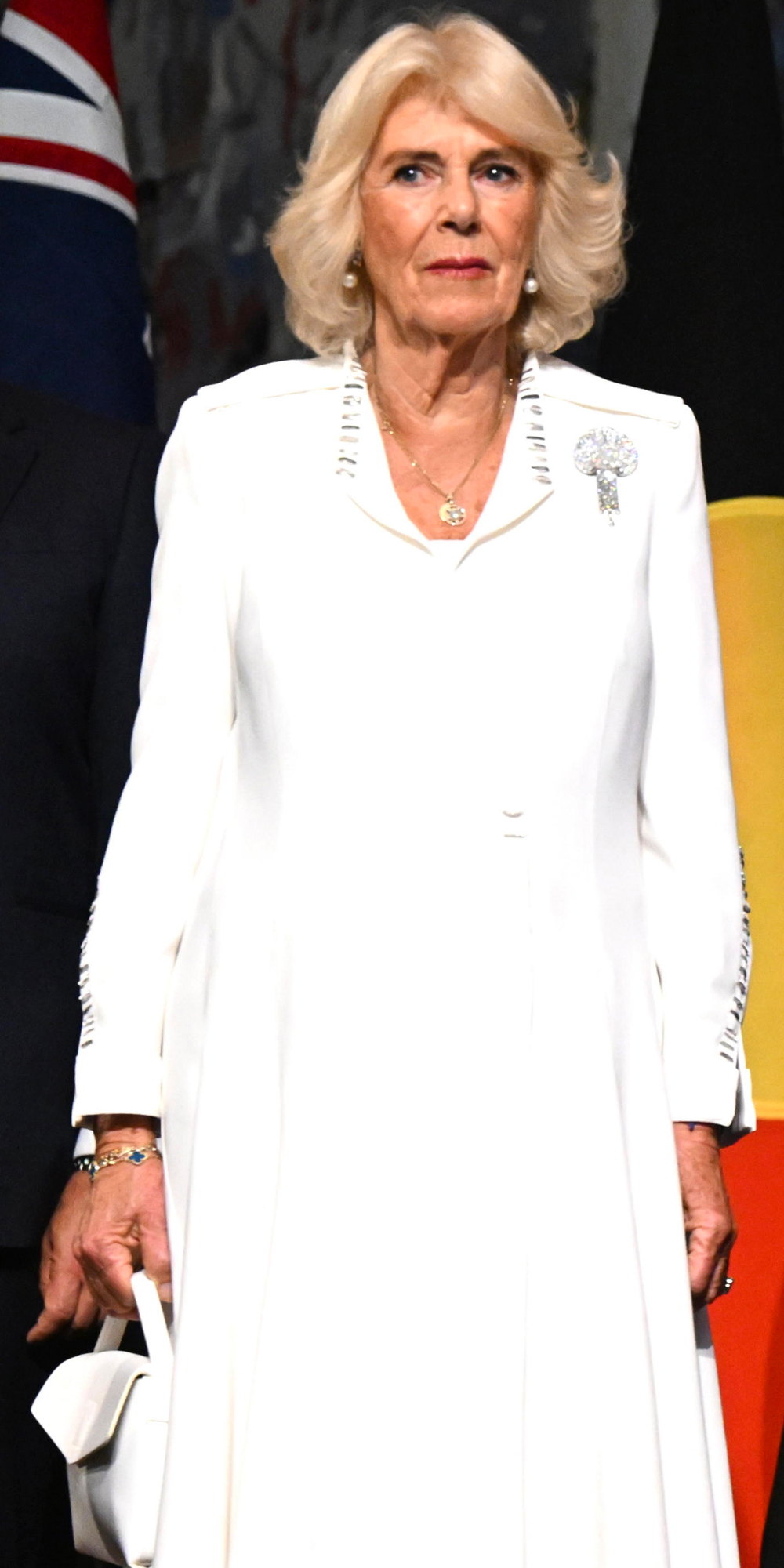 Queen Camilla in white dress in Australia