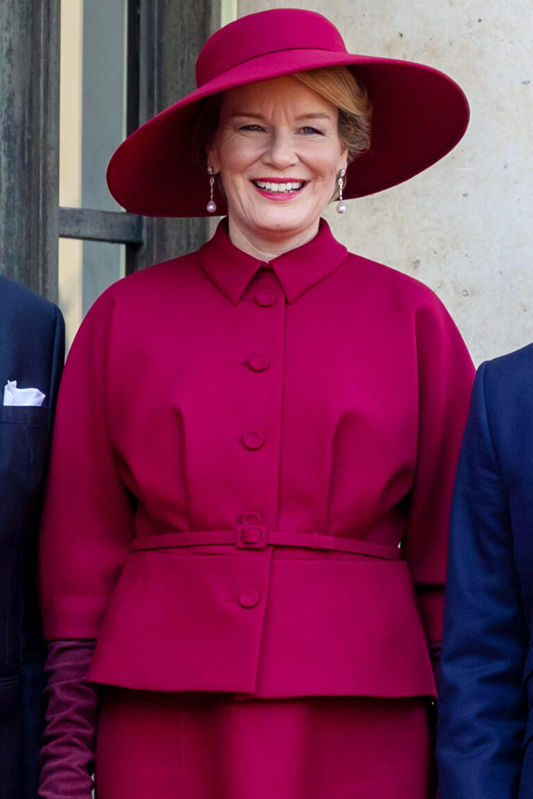 Queen Mathilde’s Parisian fashion choice: burgundy ensemble by Dior Queen Mathilde in Burgundy Dior Outfit