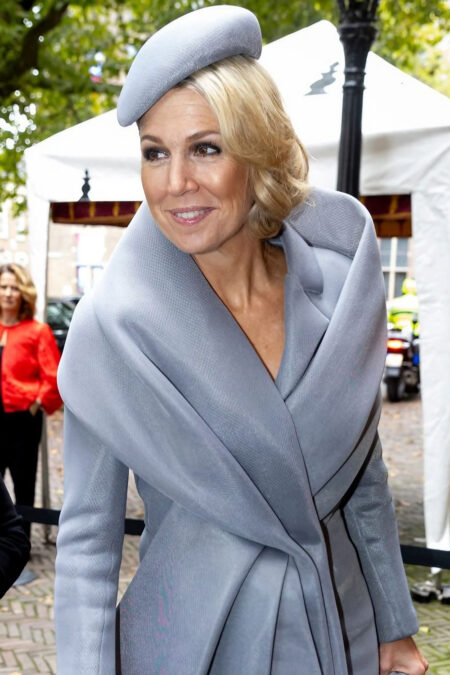 Queen Maxima in a gray dress