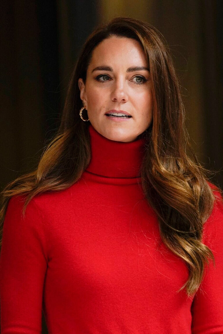 Kate Middleton’s Red Ensemble: Turtleneck Sweater and Pleated Skirt Kate Middleton's Red Ensemble
