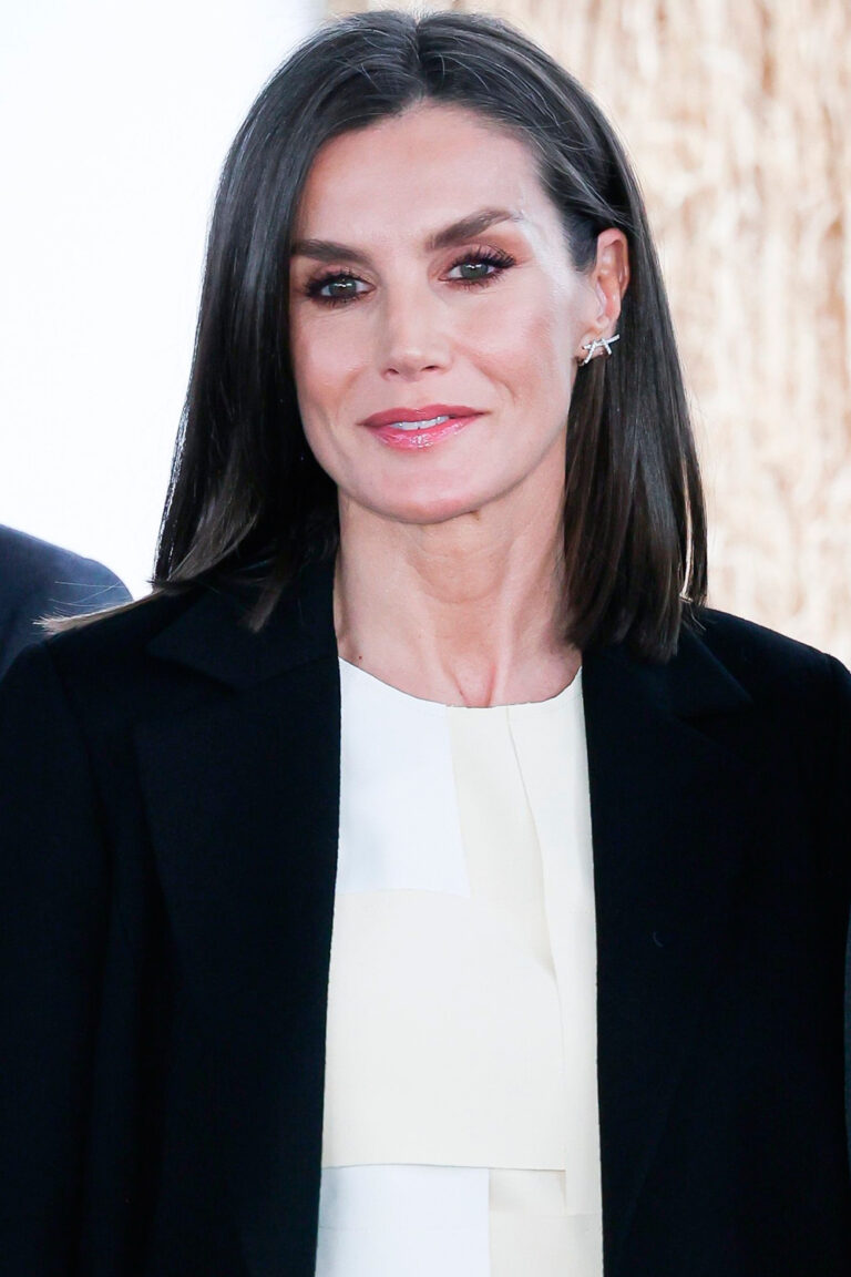 Queen Letizia in a Carolina Herrera Coat and Avant-Garde Blouse by Adolfo Dominguez Queen Letizia's style in ARCO Madrid 2024