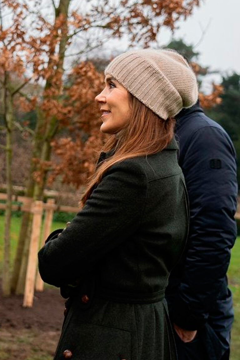 Queen Mary Plants Oak Tree in Stylish Burberry Coat Queen Mary in a belted coat by Burberry
