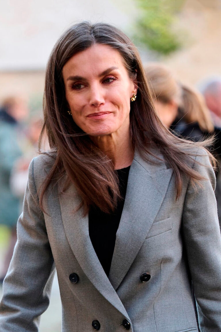 Queen Letizia’s Style: Timeless Elegance with a Black Coat and Grey Suit from Mango Queen Letizia in Gray Suit by Mango