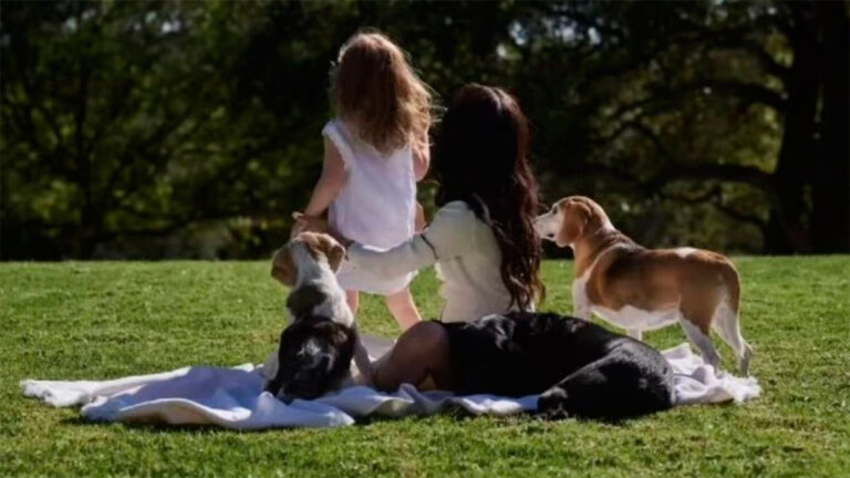 Meghan Markle with Lilibet and her two dogs.