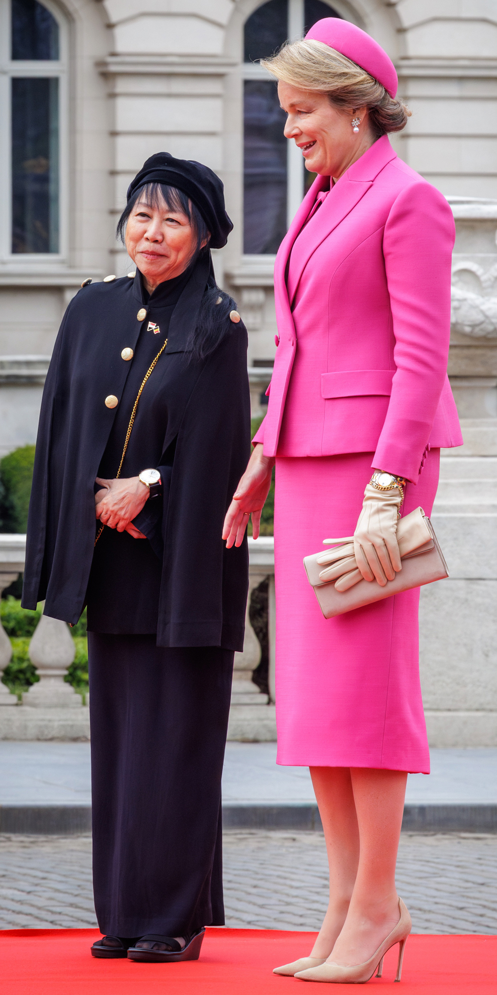 Queen Mathilde in a fuchsia outfit by Dior