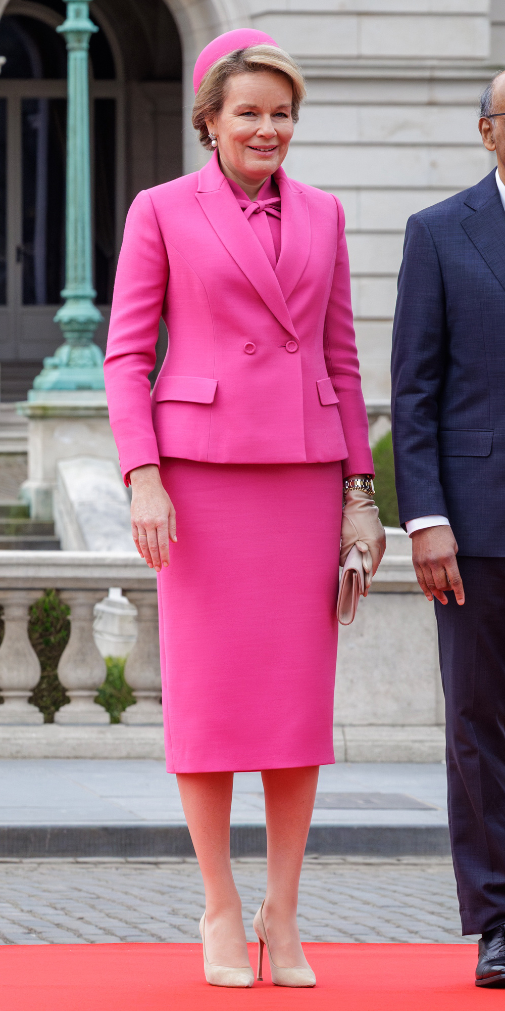 Queen Mathilde in a fuchsia outfit by Dior