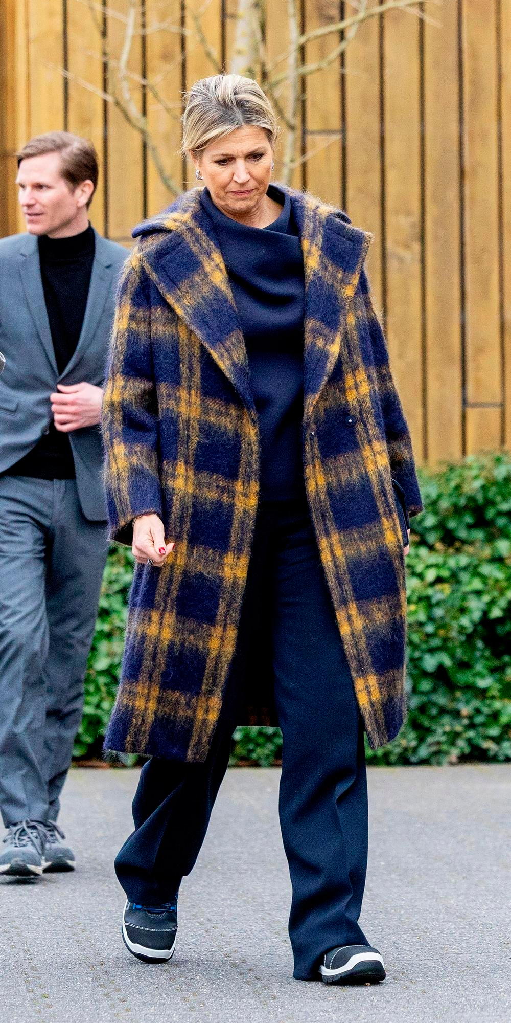 Maxima wears Dallas plaid mohair coat by Natan Couture.