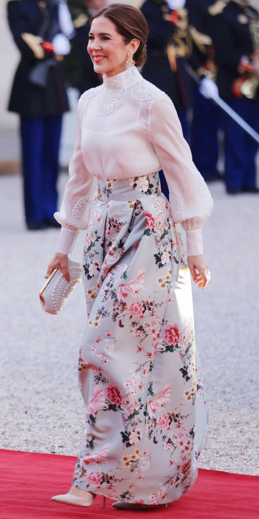 Queen Mary in maxi floral skirt by Lasse Spangenberg