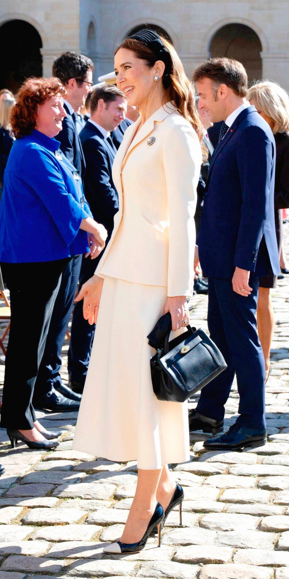 Queen Mary in a Dior outfit