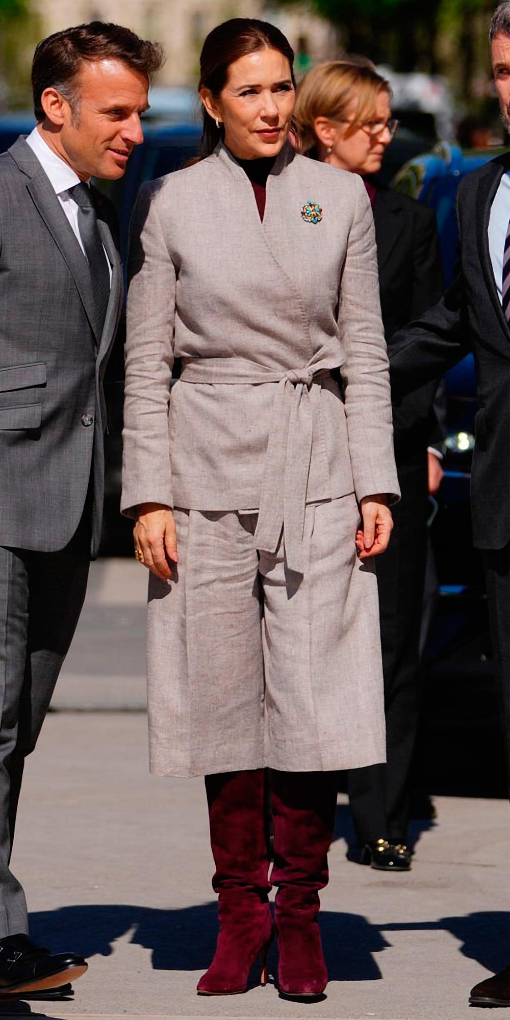 Queen Mary wears Judy Blazer and Mark Kenly Domino Tan linen culottes.