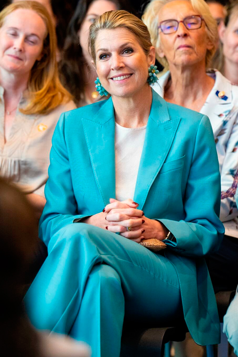 Queen Maxima wears turquoise Max Mara suit
