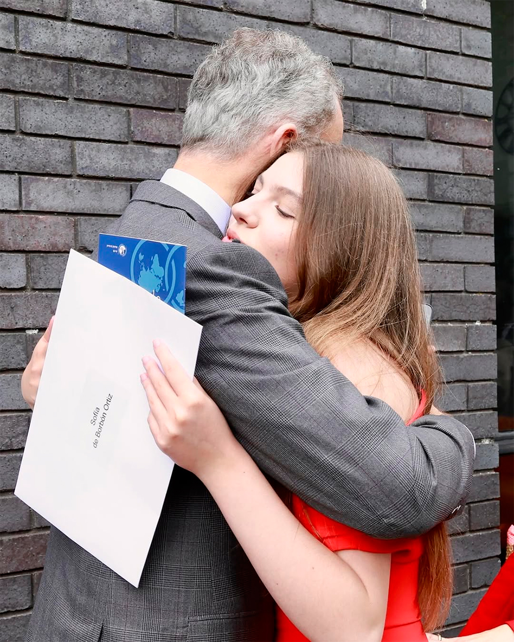 The Infanta Sofia hugging her father.