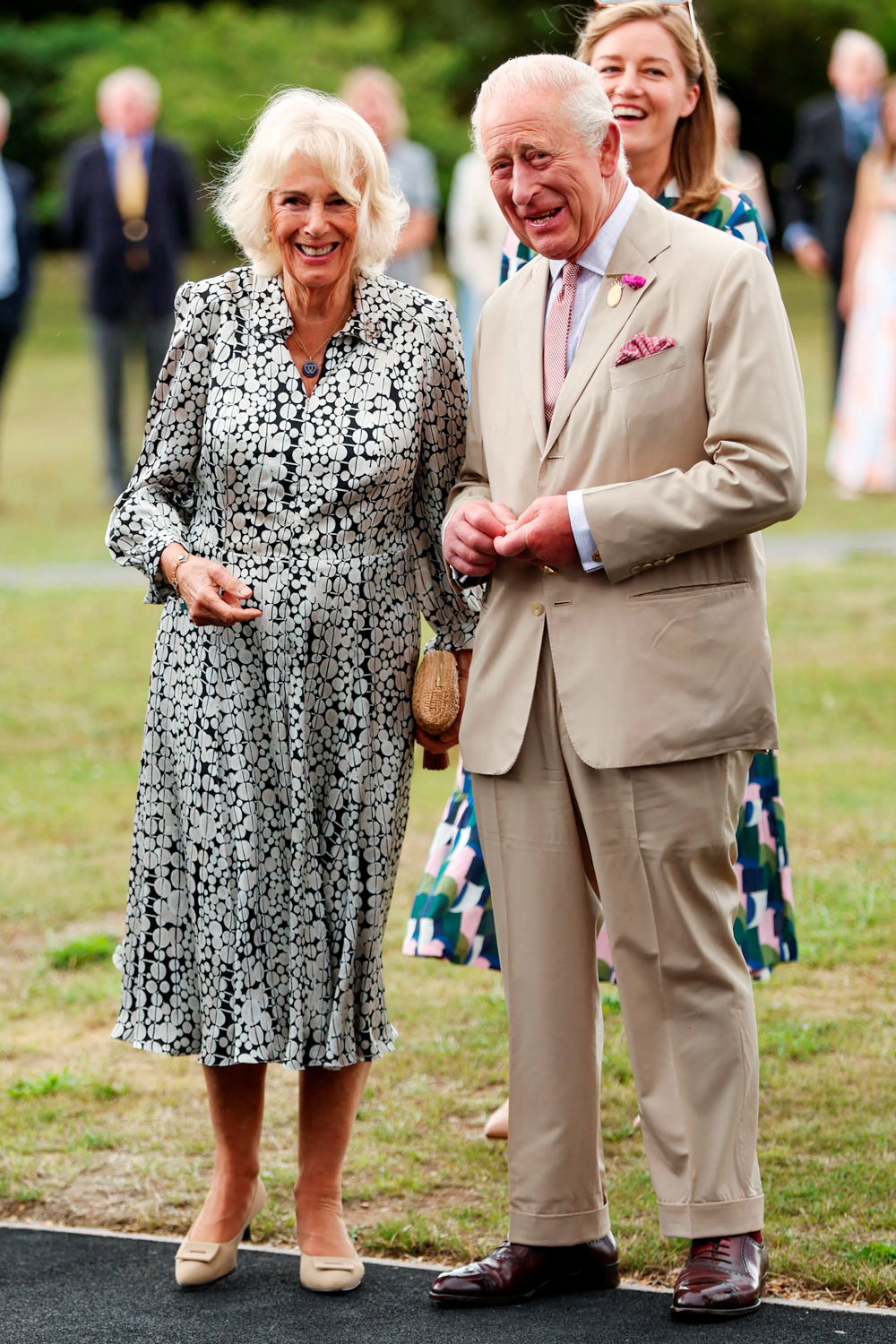 Queen Camilla and King Charles III during a visit to the Sandringham Flower Show 2025. 