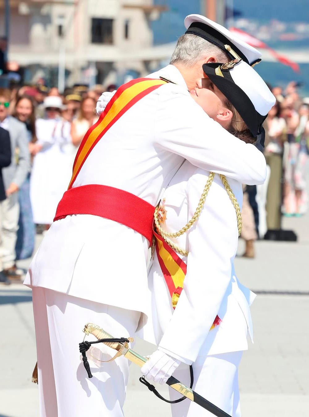 King Felipe embraces his daughter emotionally.