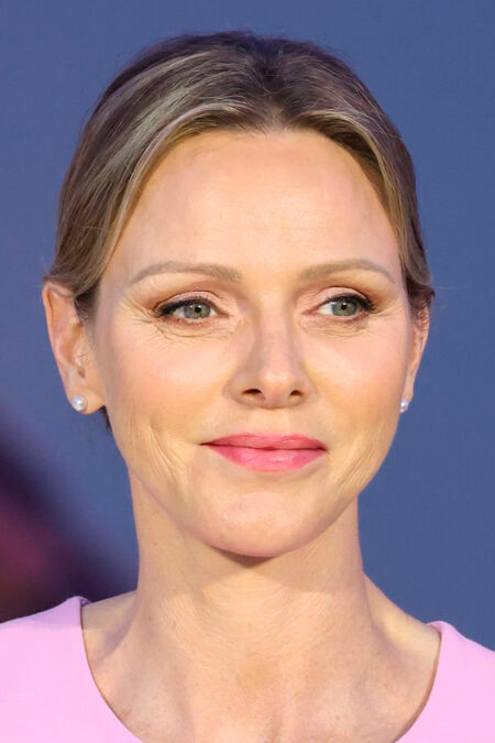Princess Charlene in a pink outfit by Akris