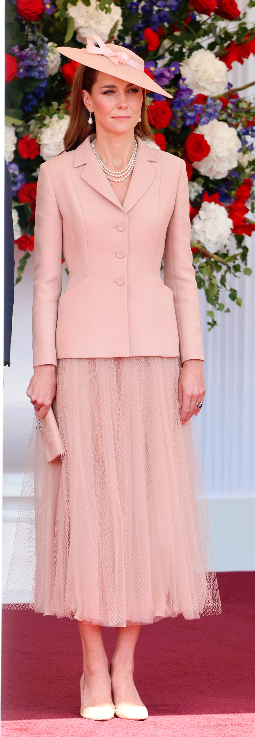 Kate wears a Dior outfit and jewelry belonging to Princess Diana and Queen Elizabeth.