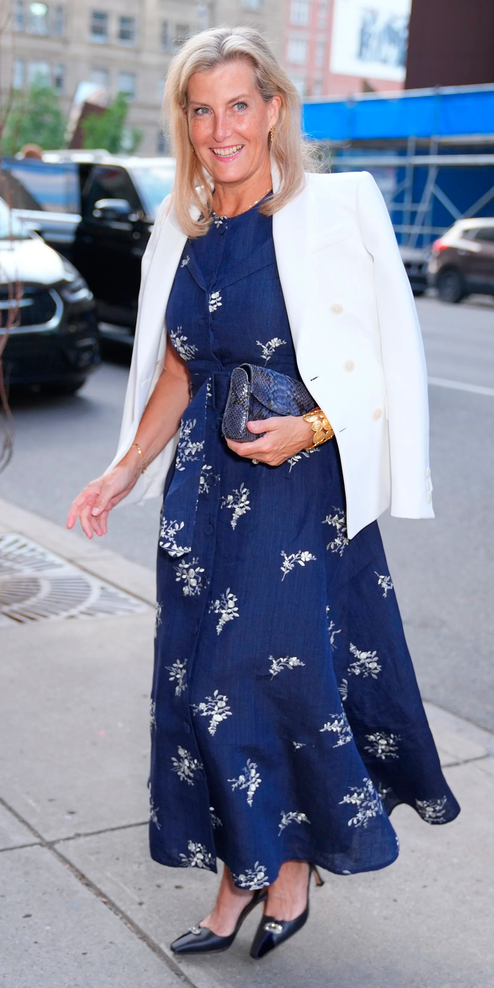 The Duchess paired Erdem embroidery with Altuzarra and a Habsburg clutch in Calgary.