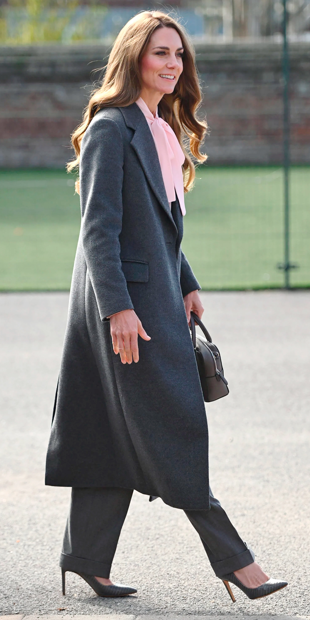 Kate Middleton chose a Jigsaw coat with a pink Burberry blouse