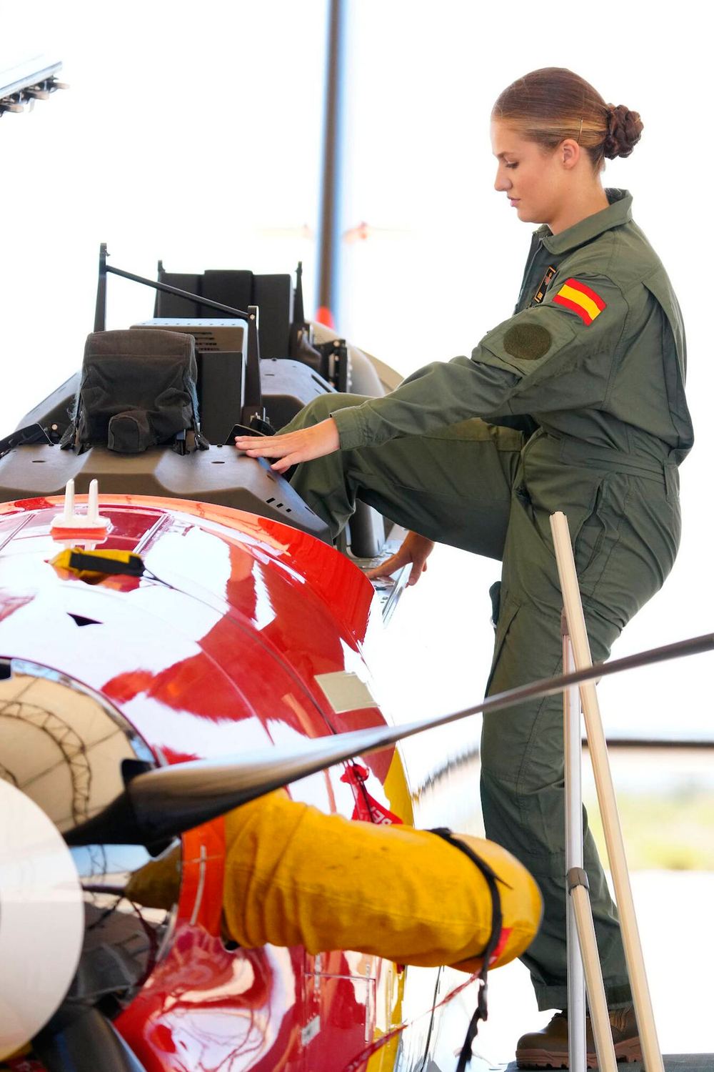 Leonor boarding a fighter jet for the first time.