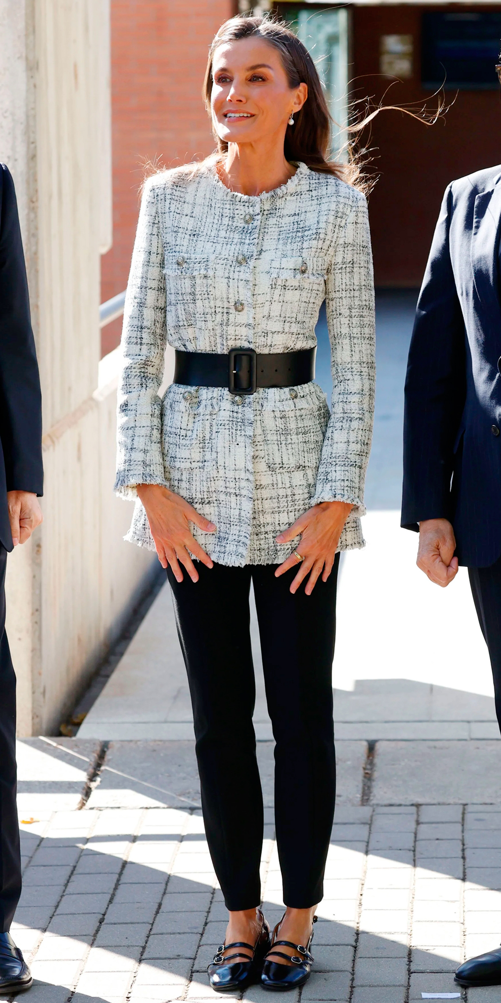 Letizia kicks off fall with a tweed jacket she elevated with a belt and patent leather Mary Janes.