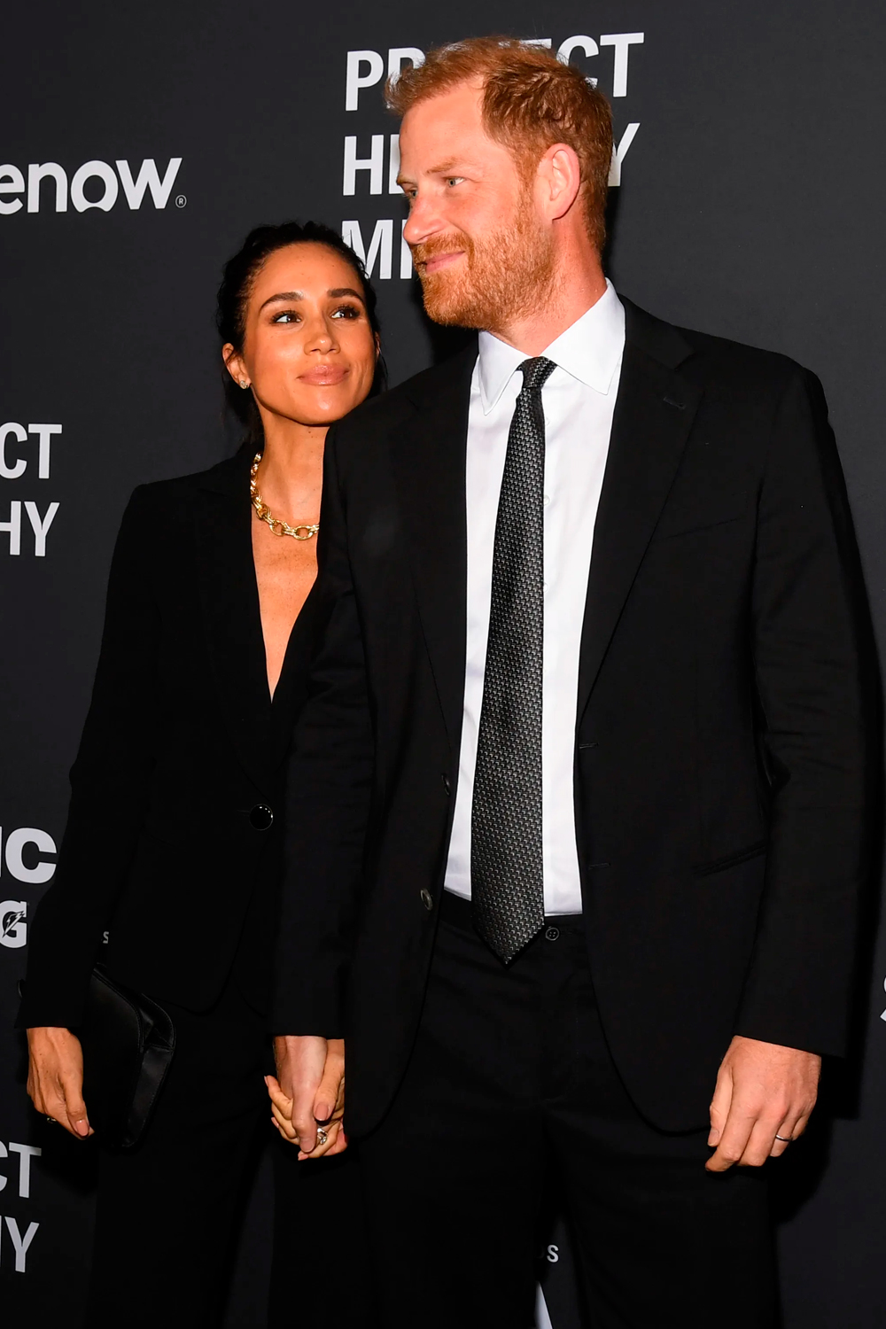Harry and Meghan arrived at the event holding hands.