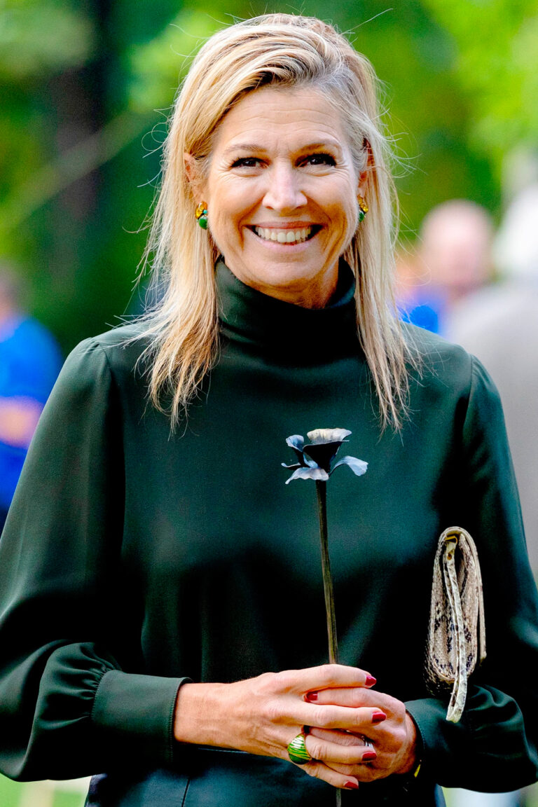 Queen Maxima Visits Hengelo Crafts Center in Elegant Dark Green Natan Couture Look Queen Maxima Stuns in Dark Green Natan Couture Outfit