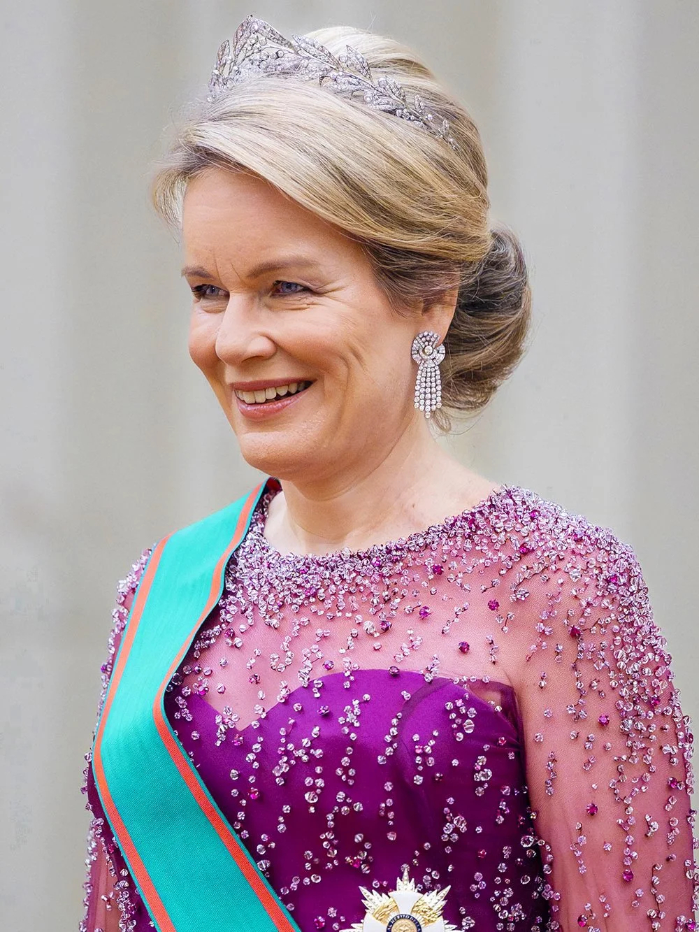 Queen Mathilde wore a striking fuchsia Armani Privé gown and her Laurel Wreath Tiara