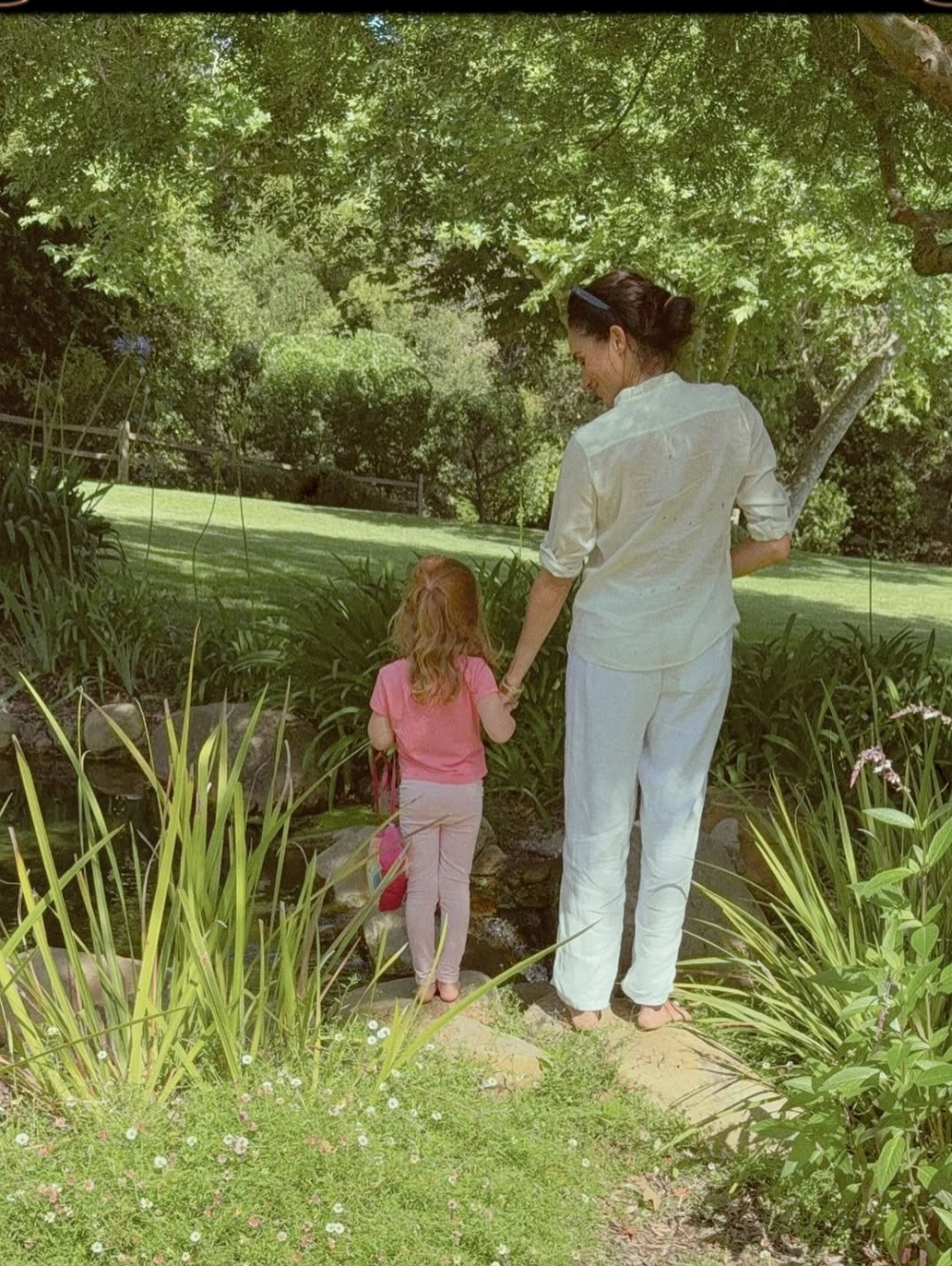 Princess Lilibet and Meghan Markle. 