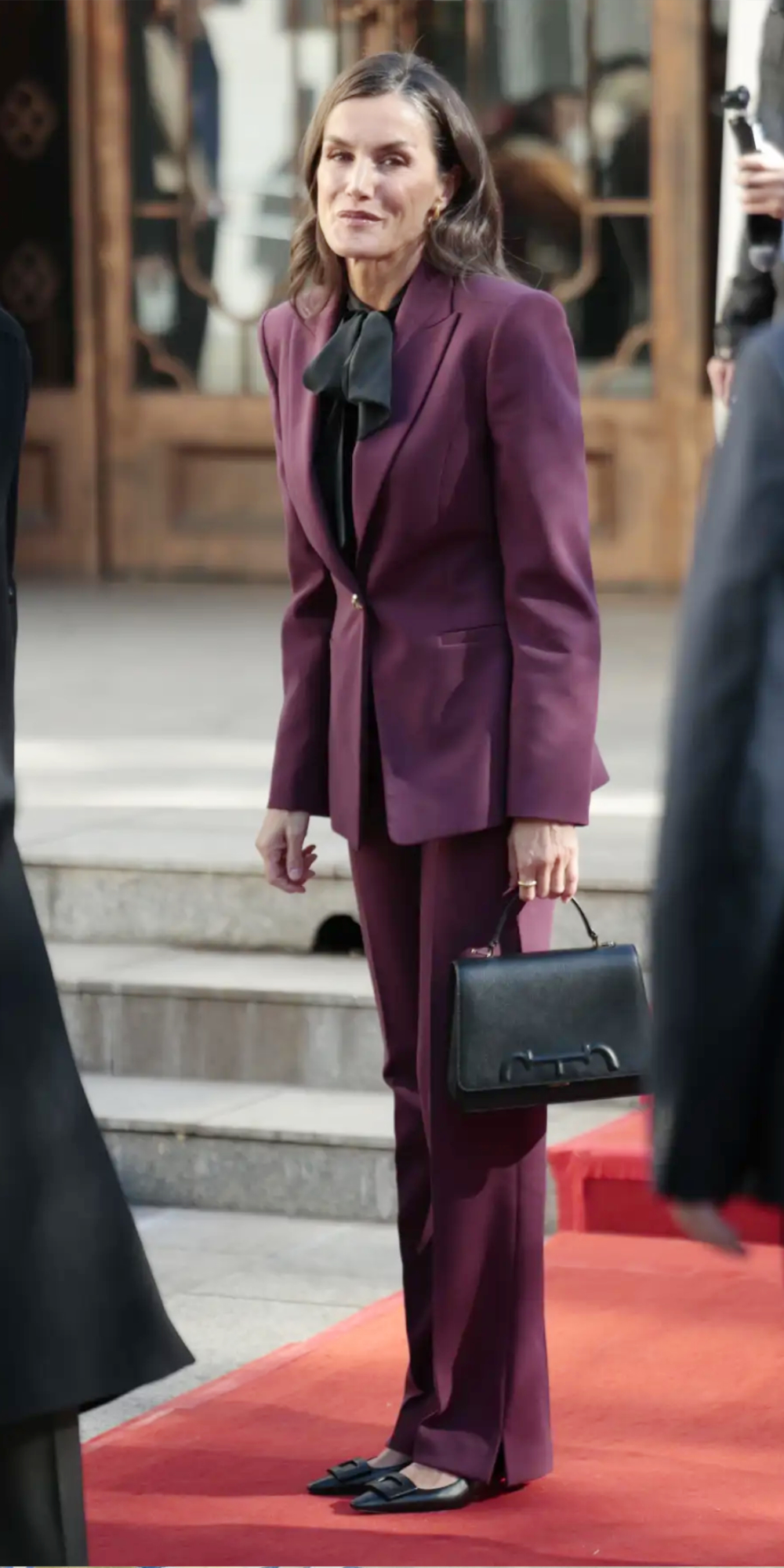 Queen Letizia Stuns in Burgundy Jacket Suit for Final Engagement in China