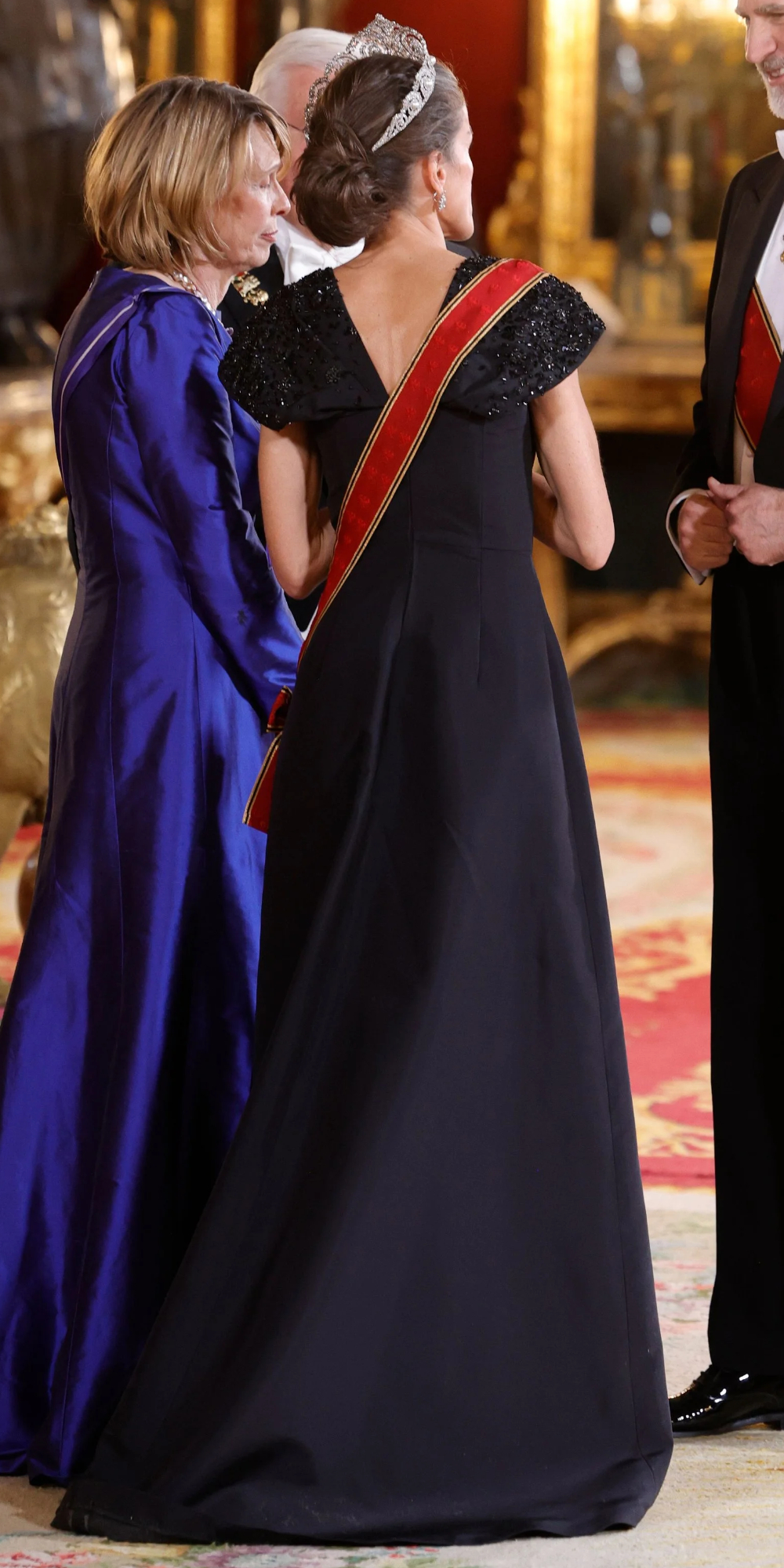 Queen Letizia's dress had a V-neckline at the back.