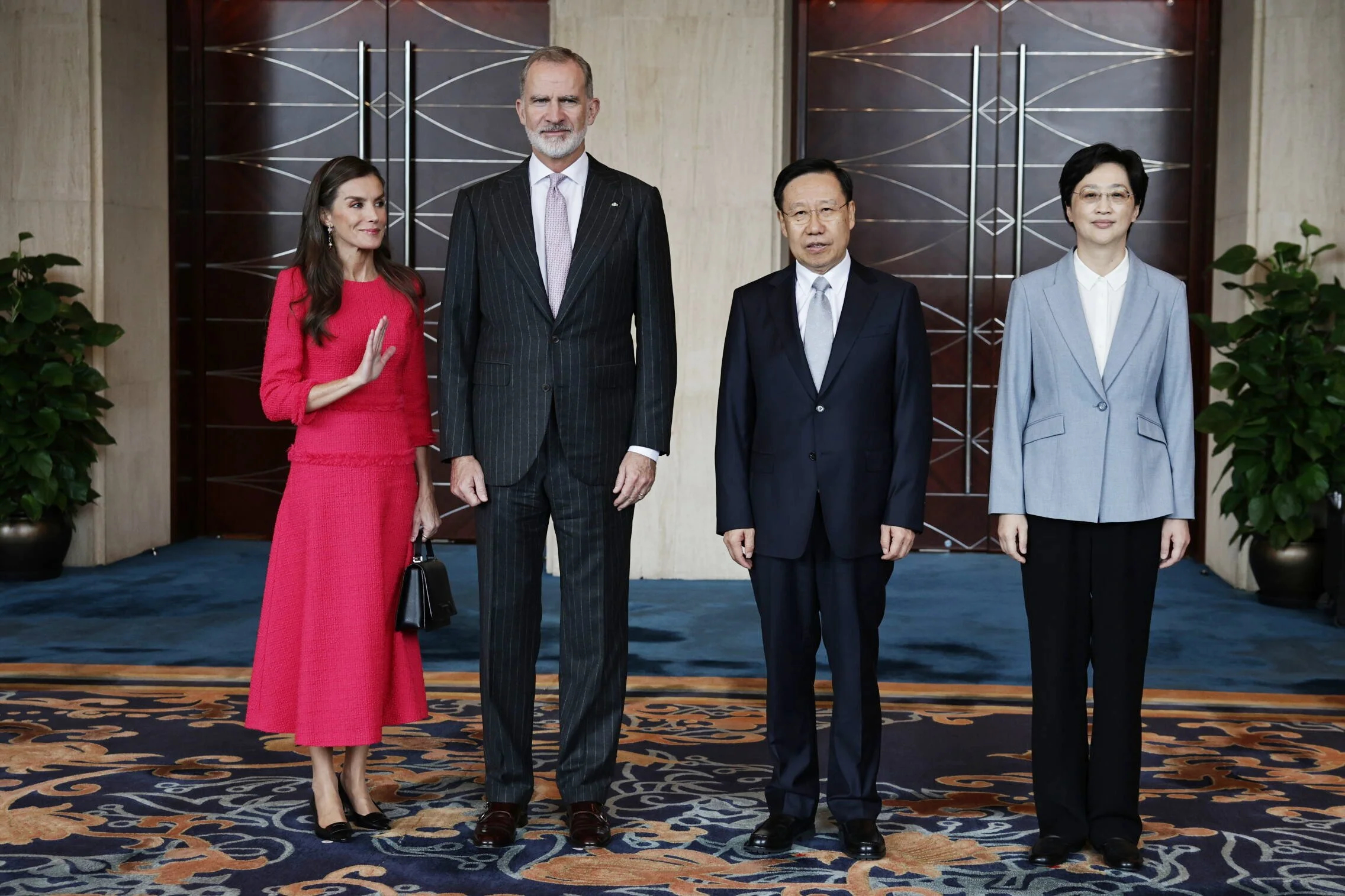 Queen Letizia Balances Bold Color and Diplomacy in a Fuchsia Dress for Her First Official Engagement in China