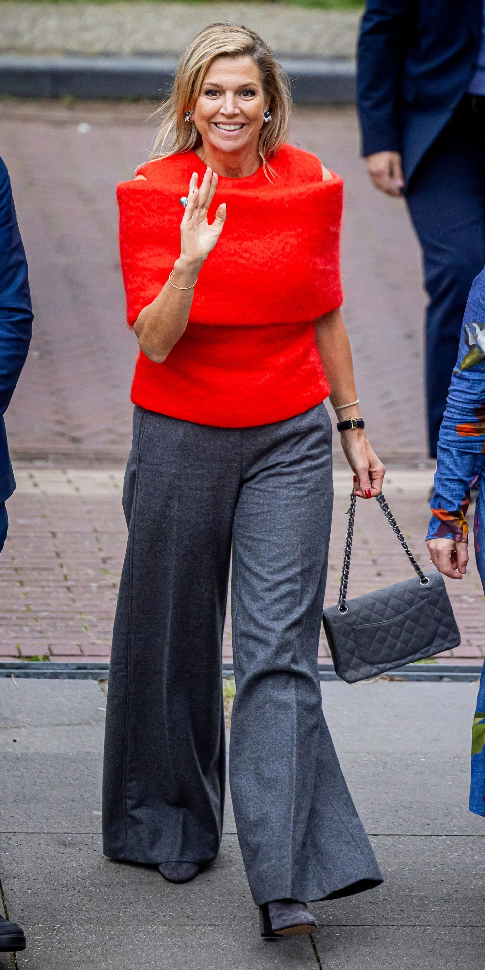 Queen Maxima Visits Haarlem in Bold Natan Outfit. 
