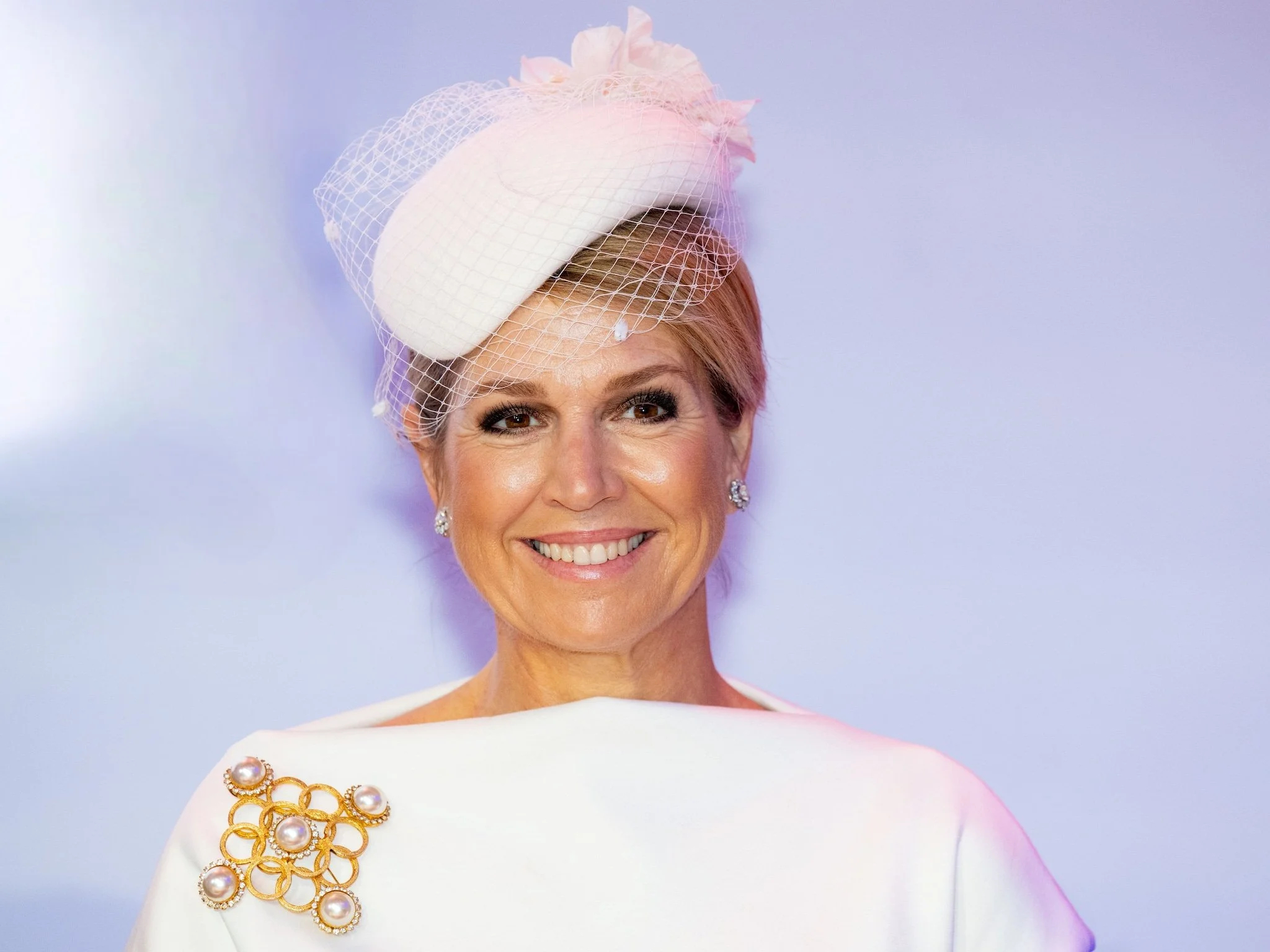 Queen Maxima Wears All-White Natan Look in Utrecht Maxima wears a Medallion brooch by Jeanne