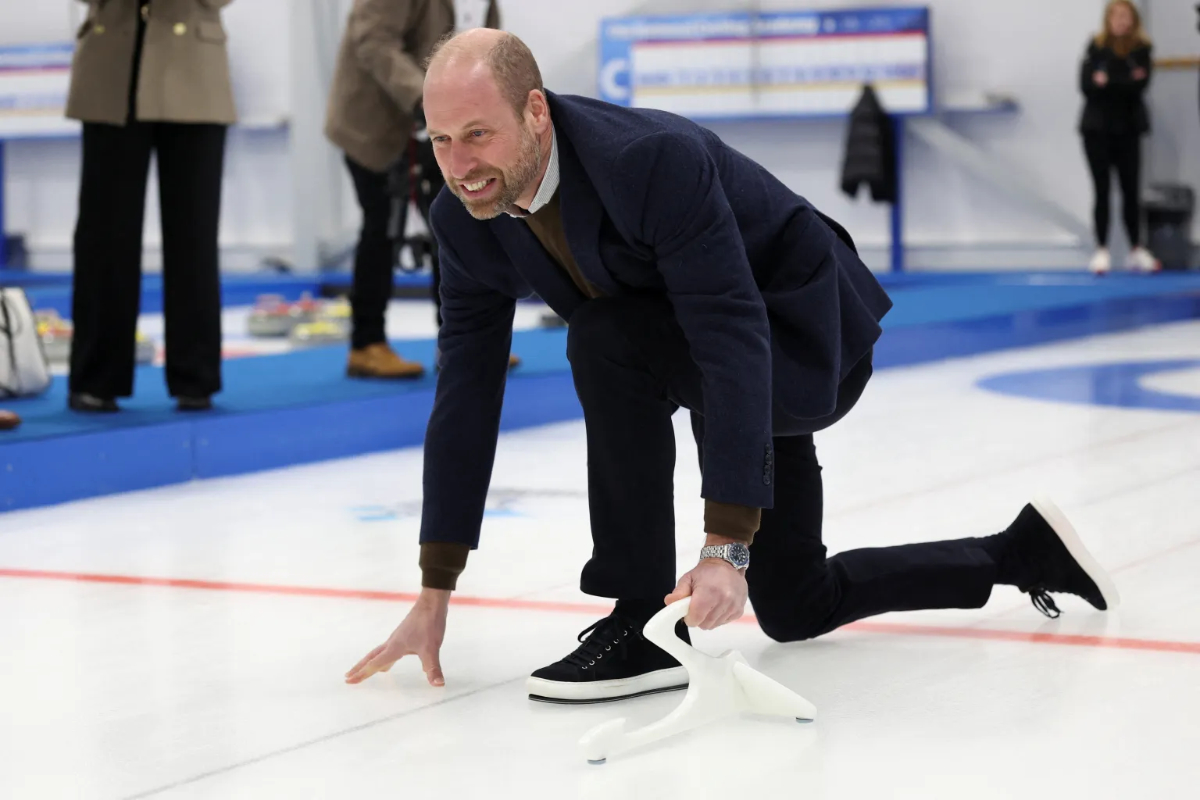 Princess Kate Plays Curling with Prince William During National Academy Visit in Stirling Prince William plays curling.